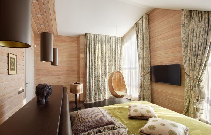 спальня в дизайне деревянного дома из бруса