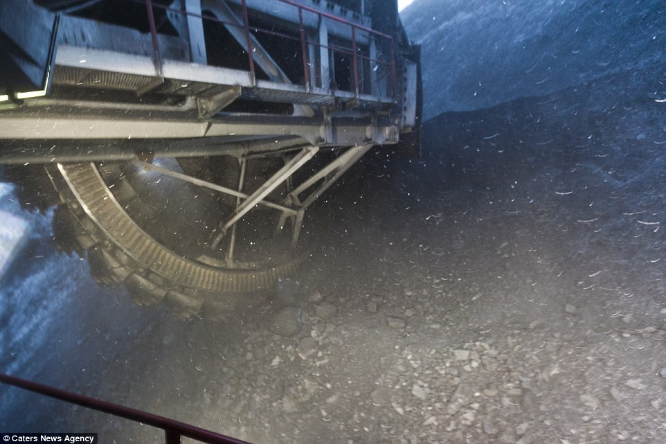 At the coal face: The enormous bucket wheel excavator (pictured) is capable of mining more than 4,500 tons of material per hour