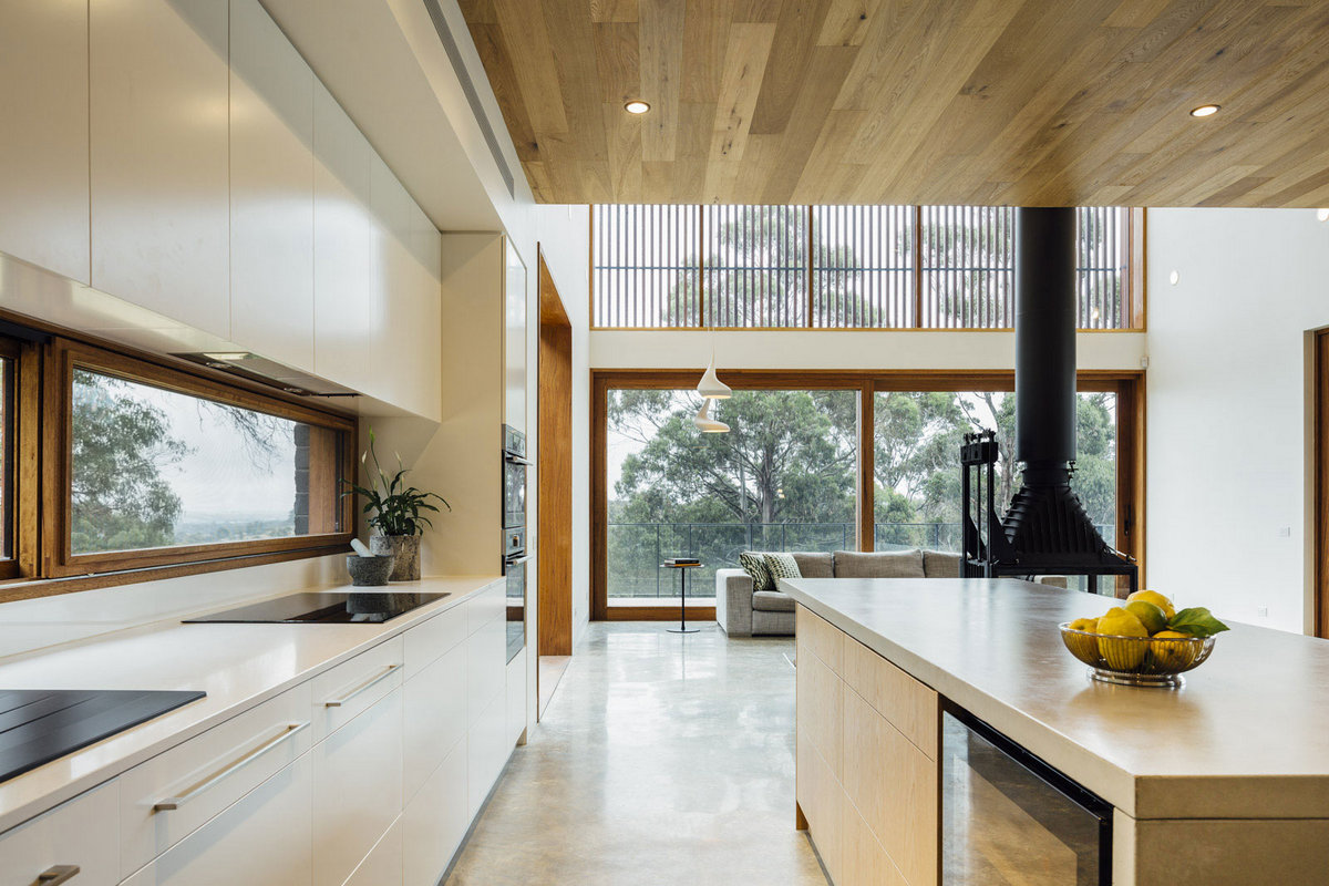 Moloney Architects, особняки в Австралии, частные дома Австралия, обзоры частных домов, фасад из камня фото, дом на склоне горы, дом с видом на город