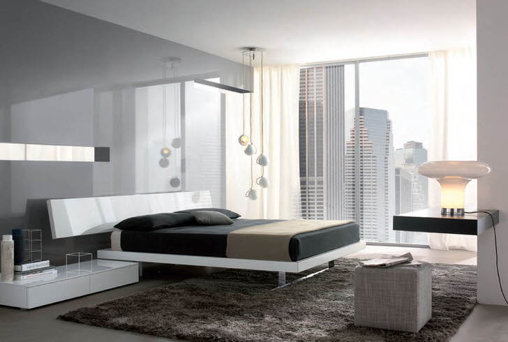 Глянцевые поверхности с металлическим блеском делают спальную комнату хай-тек более просторной и светлой.