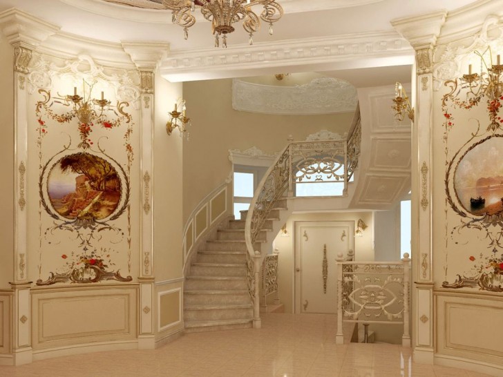 Контрастные старинные картины в интересной обработке и изысканная лестница в доме зажиточной французской семьи.